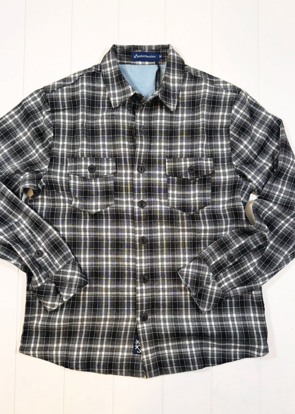 Plaid shirt with long sleeves on a white background