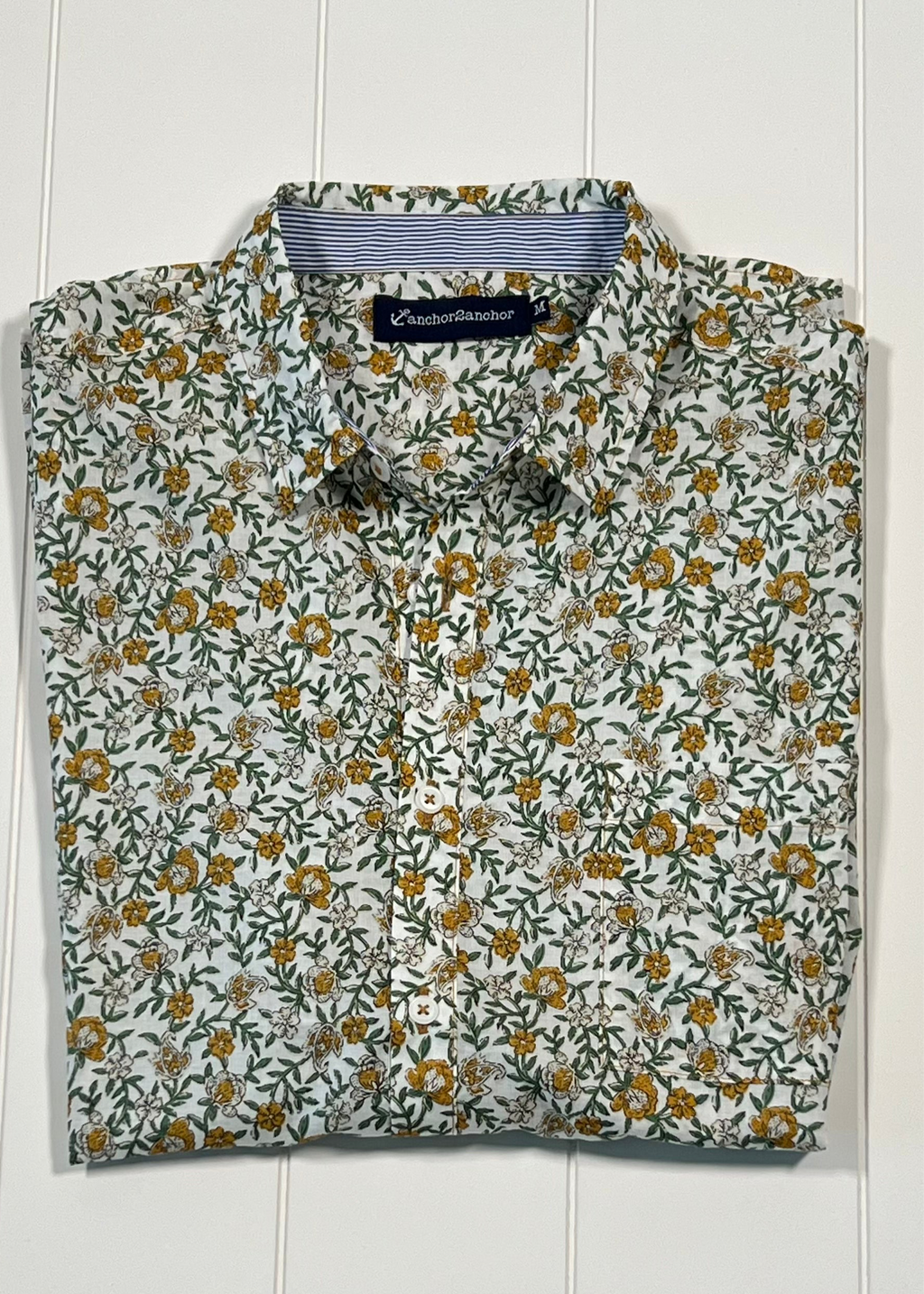 Floral patterned shirt with 'Rafale' label on a white background