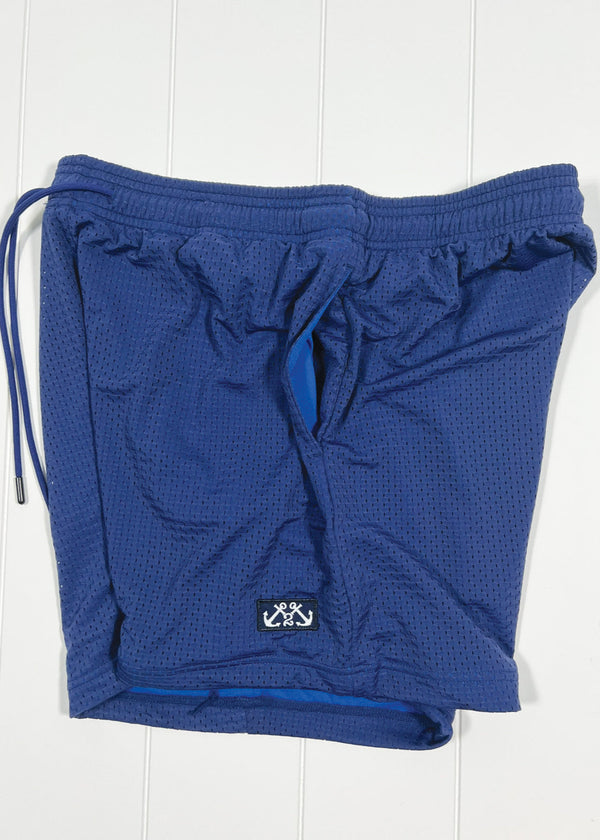 Blue shorts with a drawstring on a white background