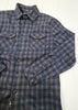 Blue plaid shirt on a white background