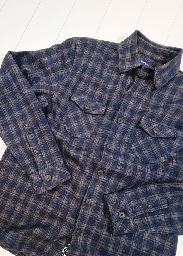 Blue plaid shirt on a white background