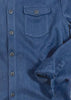 Close-up of a blue flannel shirt with a herringbone pattern