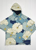 Floral patterned jacket with blue and white flowers on a white background
