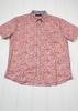 Floral patterned shirt on a white wooden surface