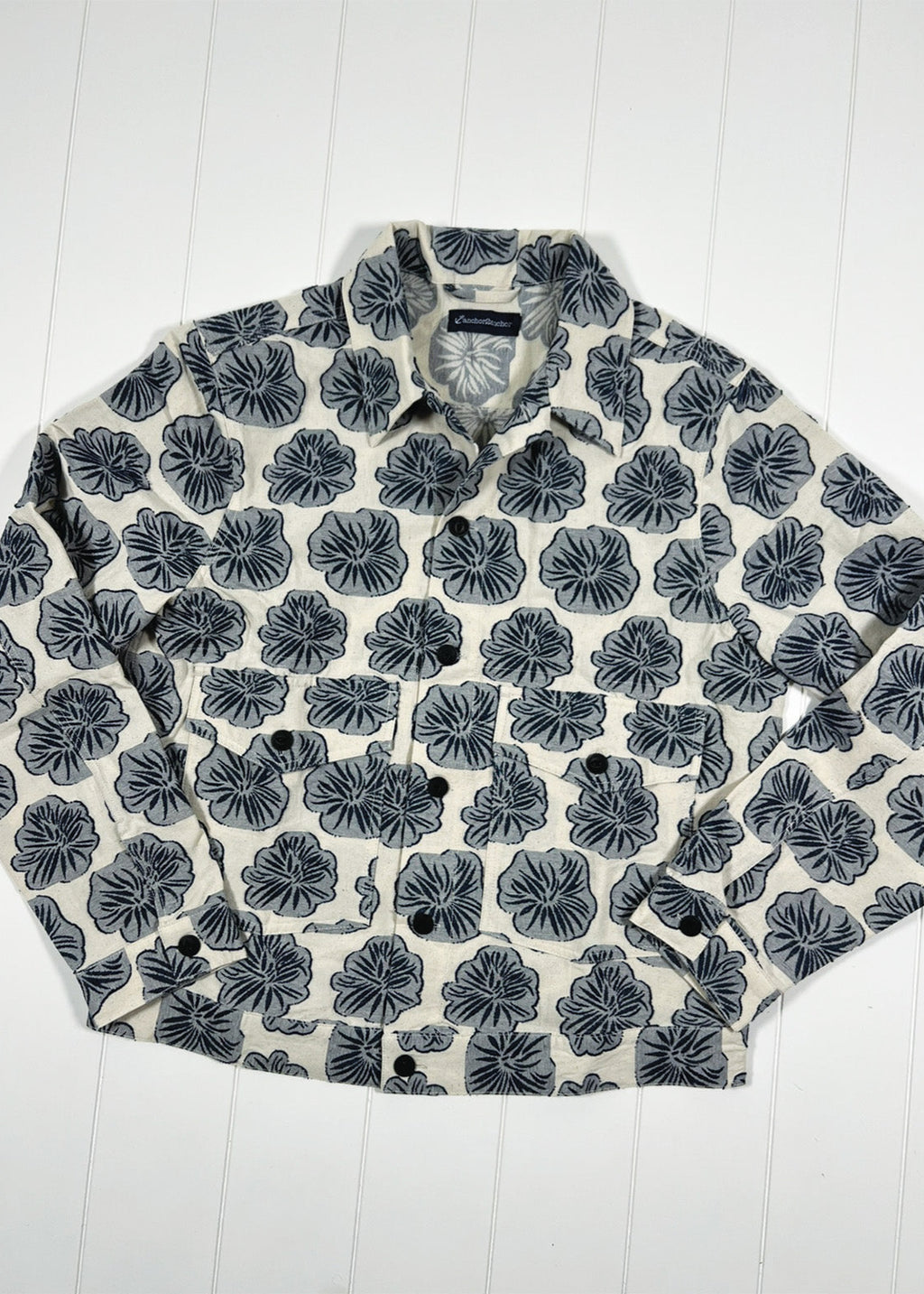 Floral patterned shirt on a white wooden background