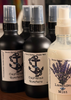 Room spray bottles with labels indicating 'Captains Quarters' and 'Lavender Mint'.