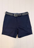Navy shorts with a belt on a light wooden background