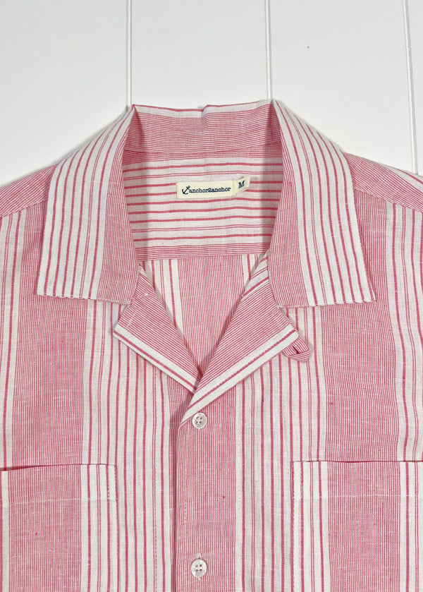 Red and white striped shirt with collar on a white background