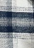 Close-up of a blue and white checkered fabric pattern