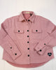 Pink checkered shirt with black buttons on a white background
