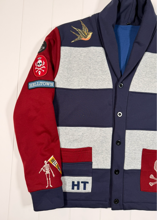 Colorful jacket with patches and branding on a white background