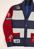 Colorful jacket with patches and branding on a white background