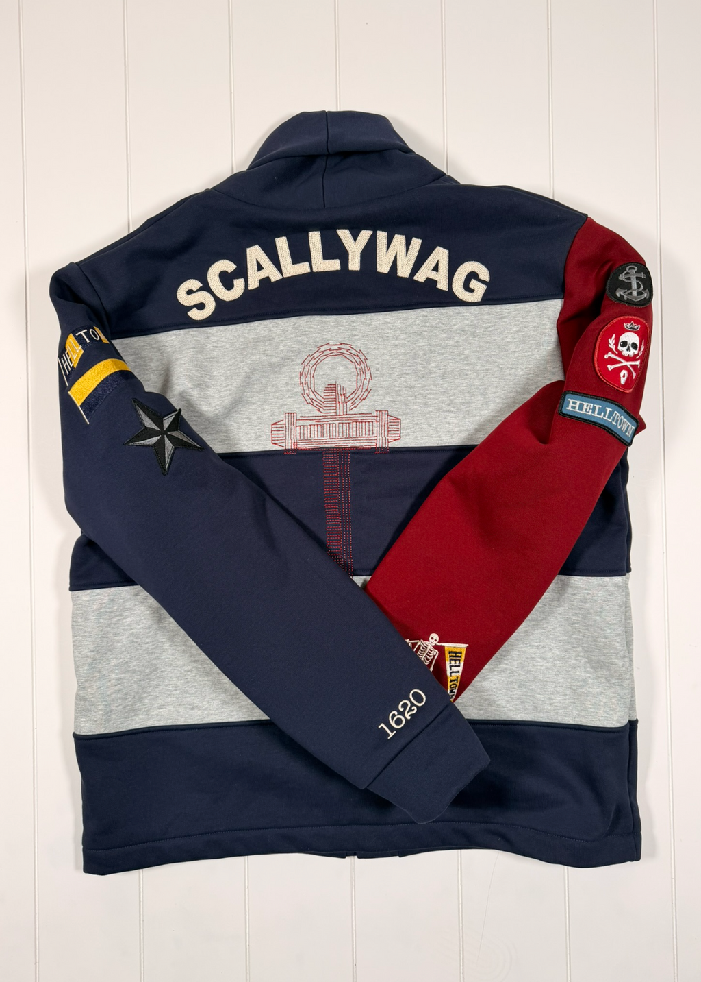Colorful jacket with 'Scallywag' branding on a white background