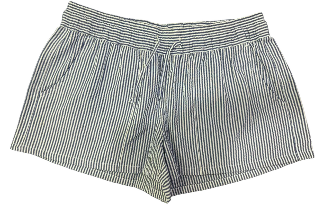 Striped shorts on a dark surface
