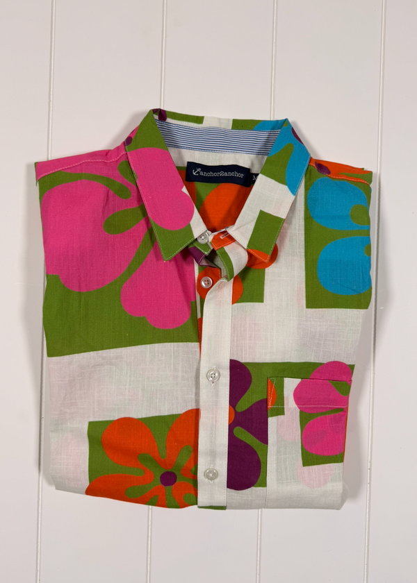 Colorful floral patterned shirt on a white background