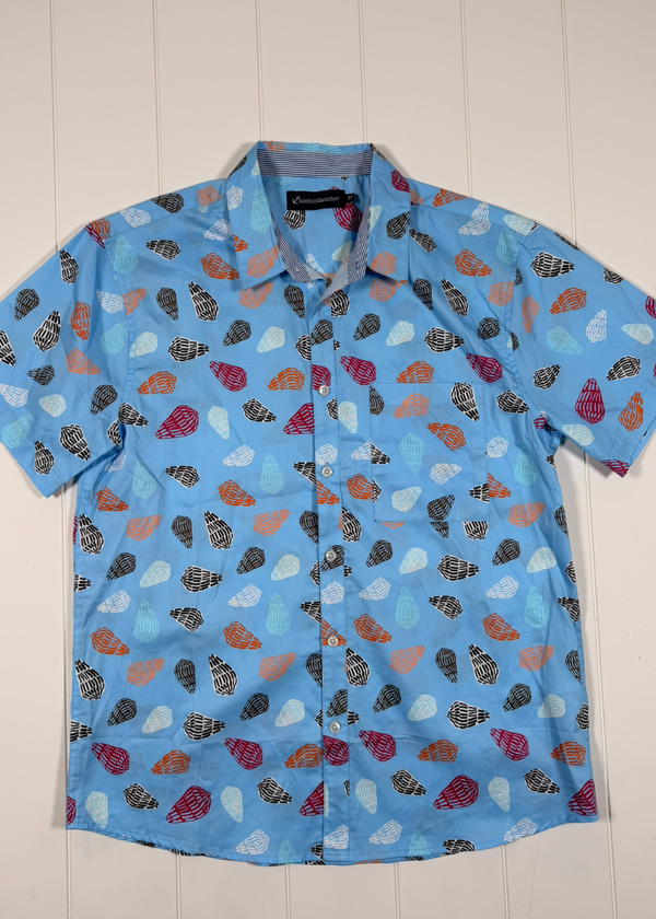 Short-sleeve shirt with colorful pattern on a white wooden background