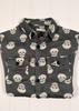 Flannel shirt with skull pattern on a white background