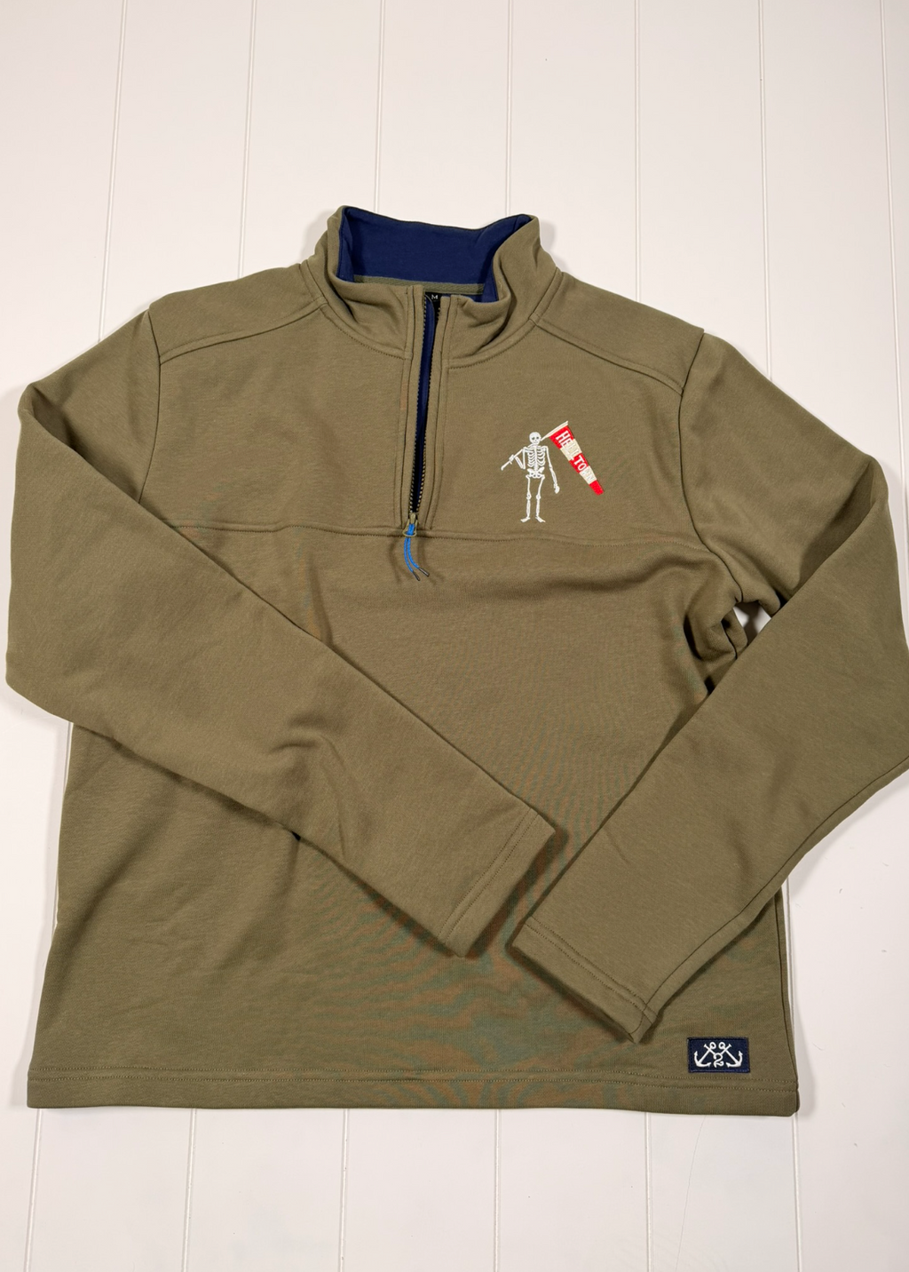 Green pullover with a logo on a white background