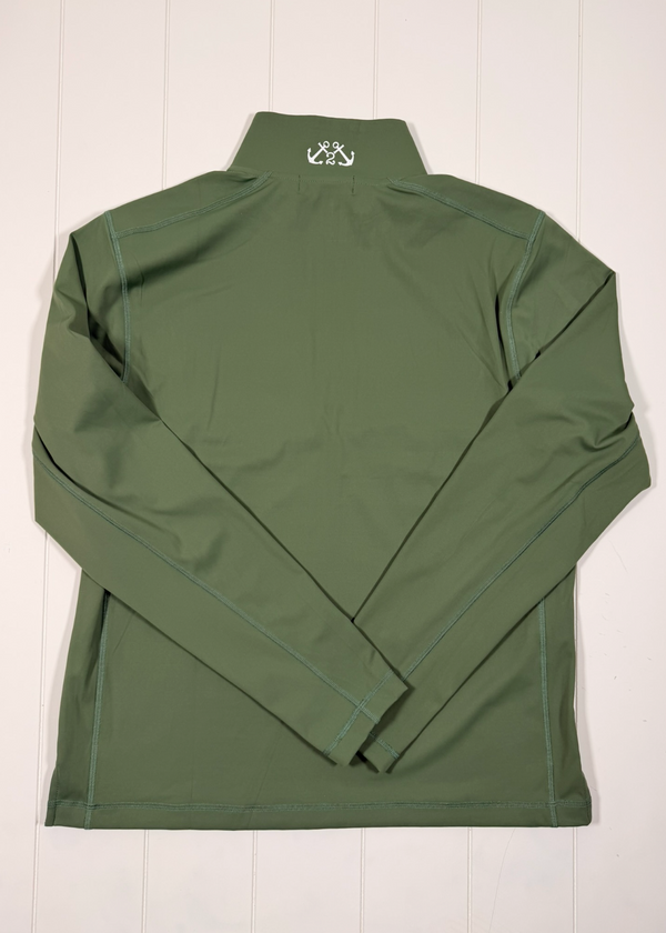 Green long-sleeve shirt with a logo on a white wooden surface