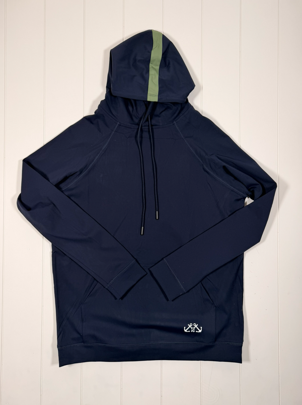 Navy blue hoodie with a green stripe on a white wooden surface