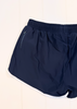 Navy blue athletic shorts with an elastic waistband and a side zippered pocket, shown against a white paneled background.