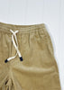 Beige corduroy shorts with a drawstring on a white background
