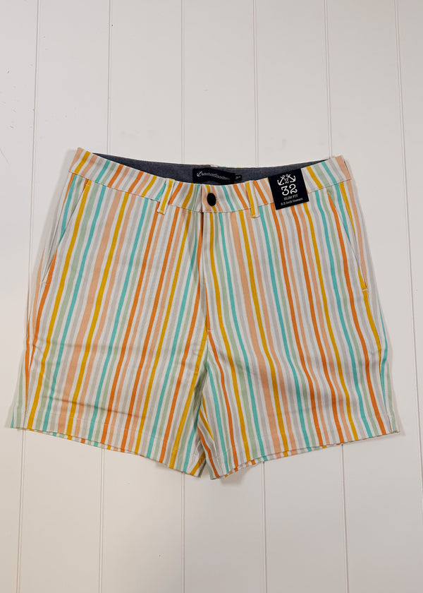 Multicolored striped shorts on a white wooden background