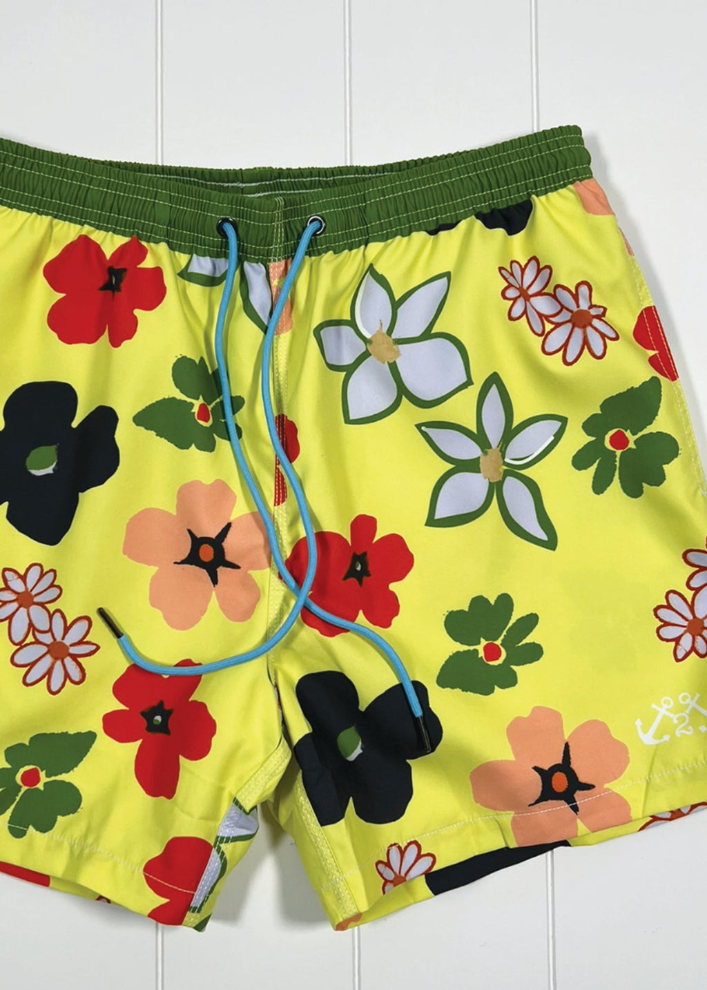 Floral-patterned shorts on a white background