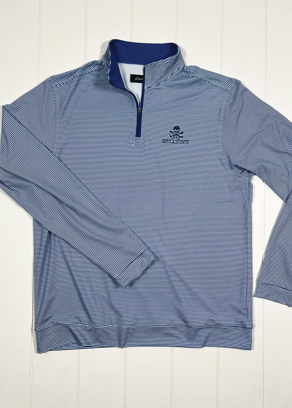 Blue striped long-sleeve shirt with a logo on a white background