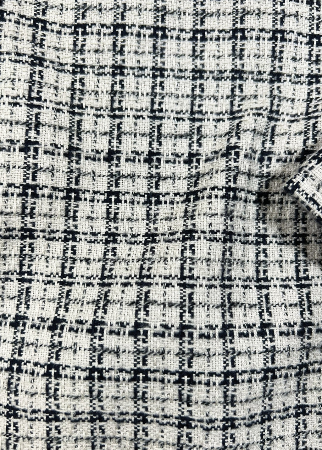 Close-up of a black and white checkered fabric pattern